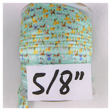 Load image into Gallery viewer, FOE by the Yard - 5/8" - Disney Dogs on light green
