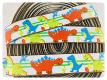 Load image into Gallery viewer, Ribbon by the Yard - 7/8" - Dinosaur Ribbon - Orange, blue, green