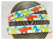 Load image into Gallery viewer, Ribbon by the Yard - 7/8" - Dinosaur Ribbon - Orange, blue, green