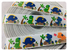 Load image into Gallery viewer, Ribbon by the Yard - 7/8&quot; - Dinosaur Ribbon - Orange, Blue, Green
